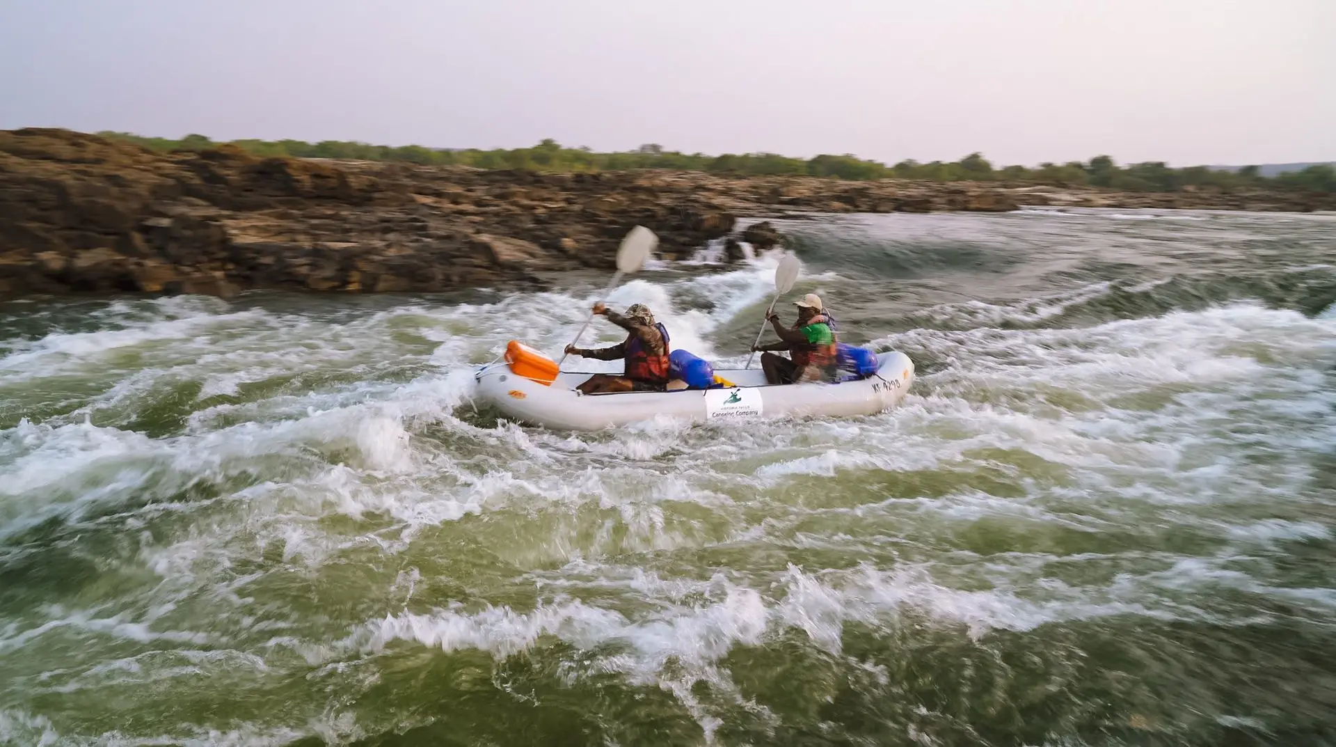Paddlers in white water