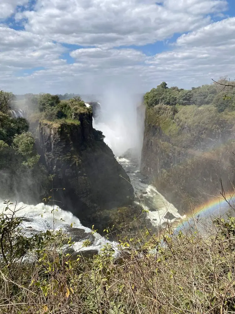 Victoria Falls with a rainbow in the spray